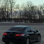 Toyota Camry Hybrid вид ззаду трансфер Київ Варшава