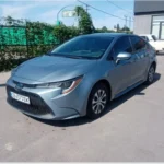 Сірий седан Toyota Corolla для таксі з Ужгорода до Катовіце