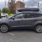 Київ Познань: сірий Ford Escape з багажним боксом на даху