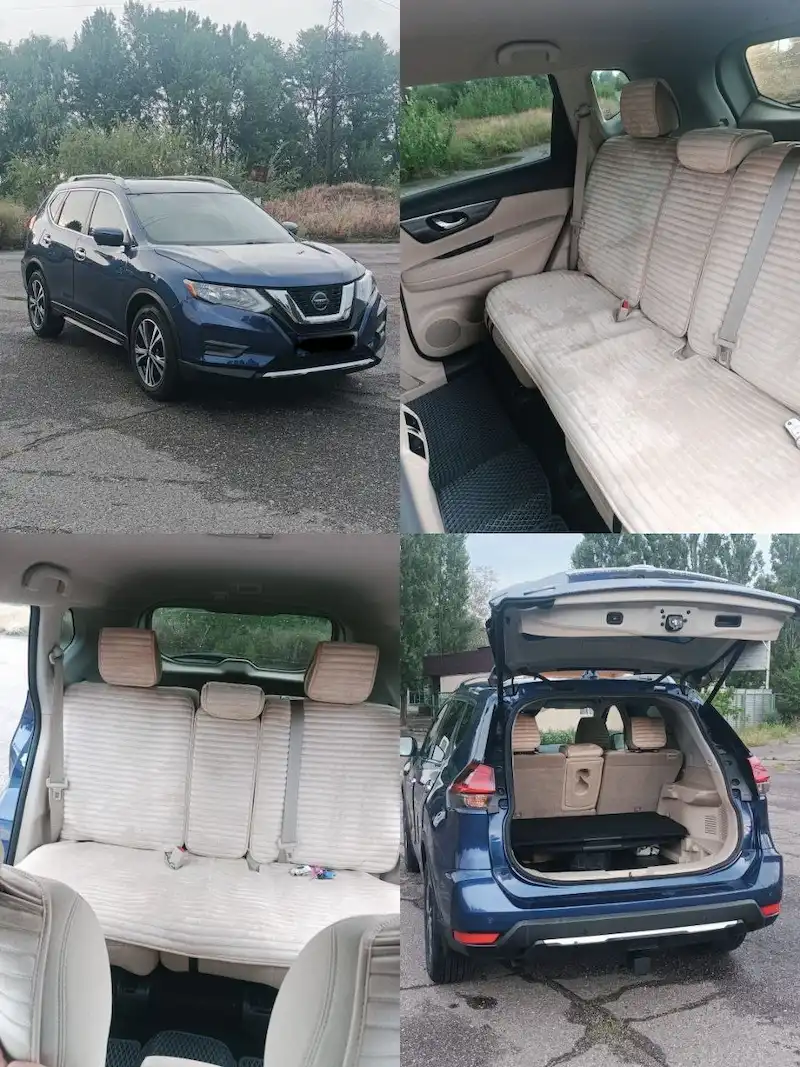 Київ Познань: синій кросовер Nissan Rogue, задні сидіння і багажник