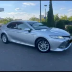 Львів Вроцлав: сріблястий седан Toyota Camry на парковці